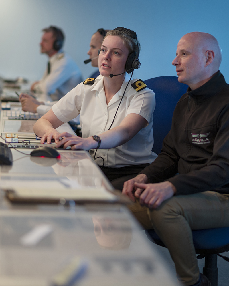 Aquila Maintainers work alongside Royal Navy personnel